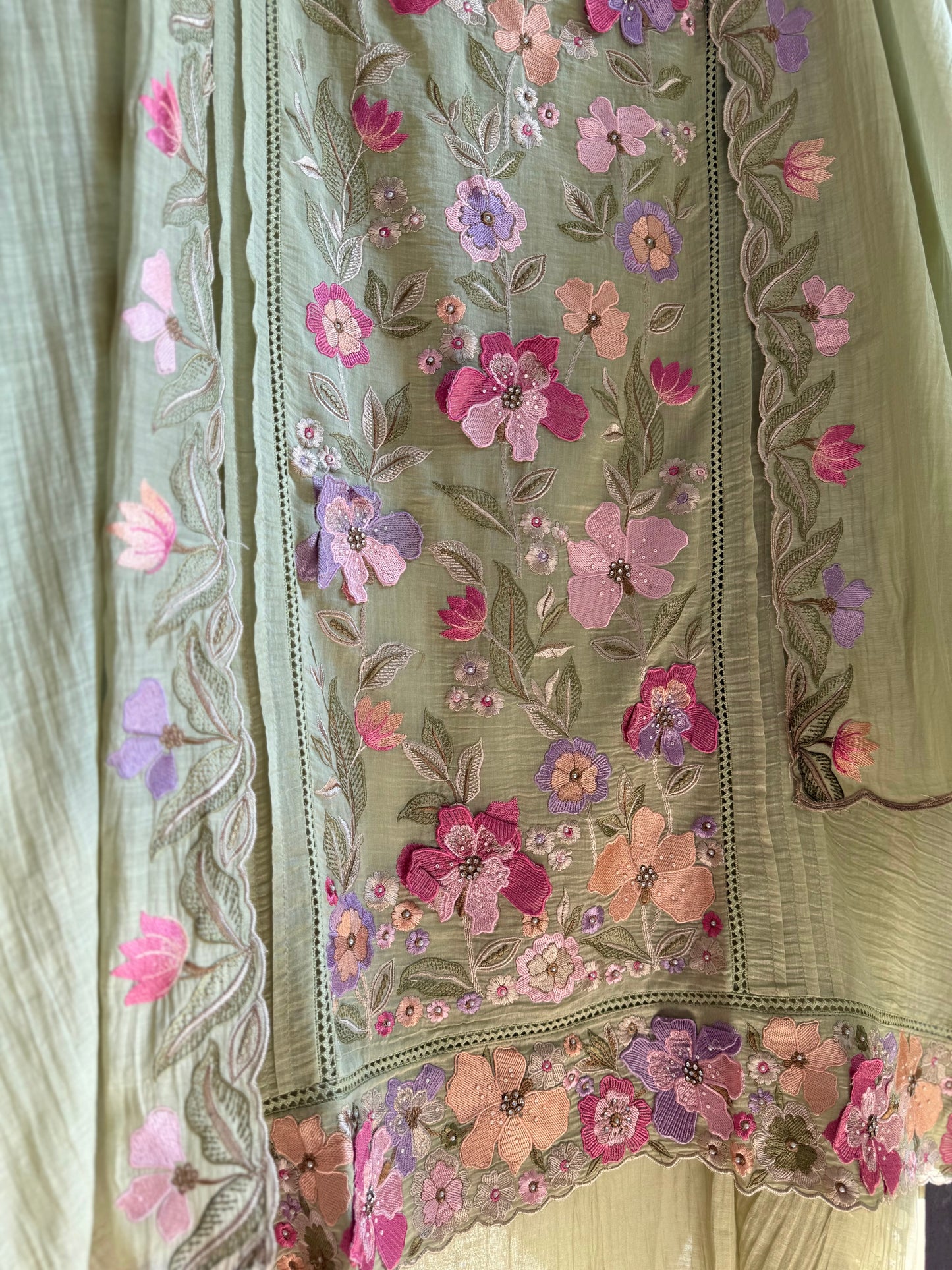 Luxurious Mul chanderi appliqué work floral suit