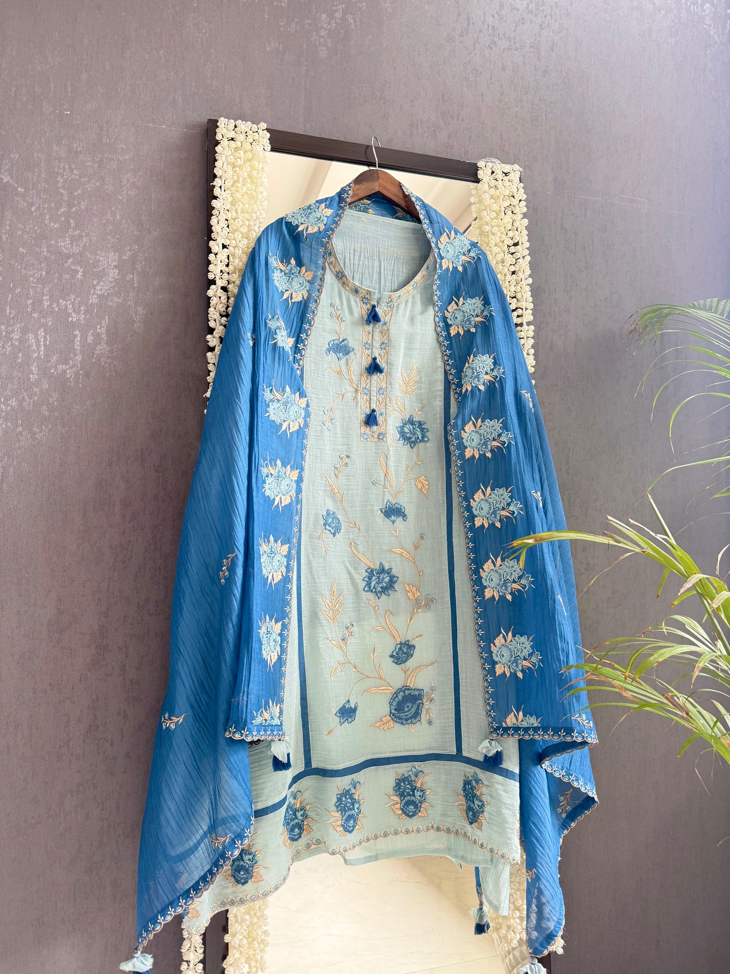 Luxurious Mul chanderi appliqué floral suit
