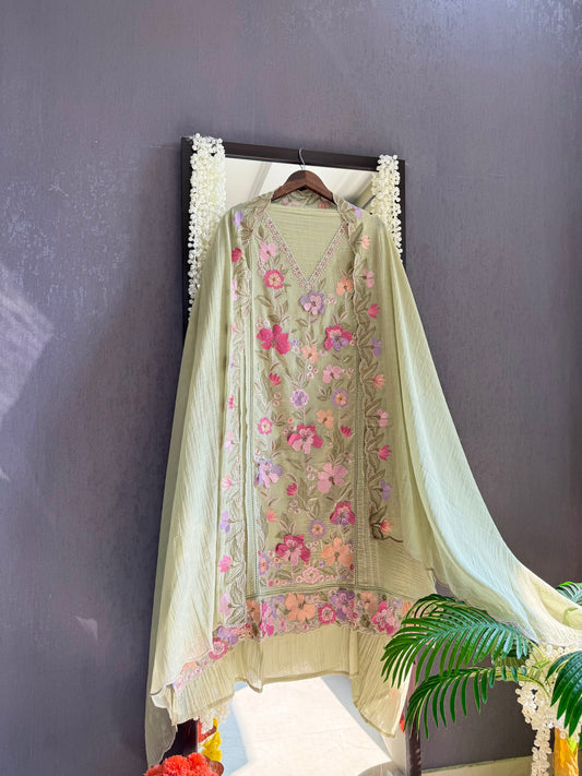 Luxurious Mul chanderi appliqué work floral suit