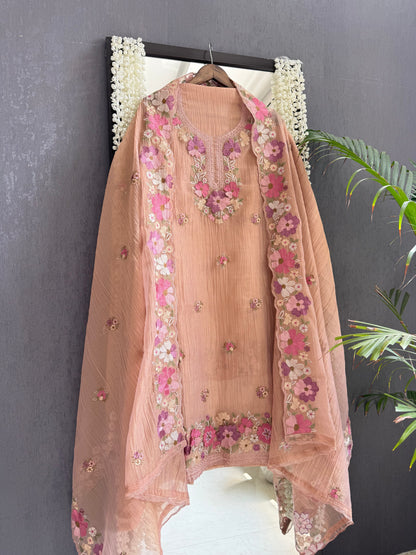 Luxurious Mul chanderi appliqué work floral suit