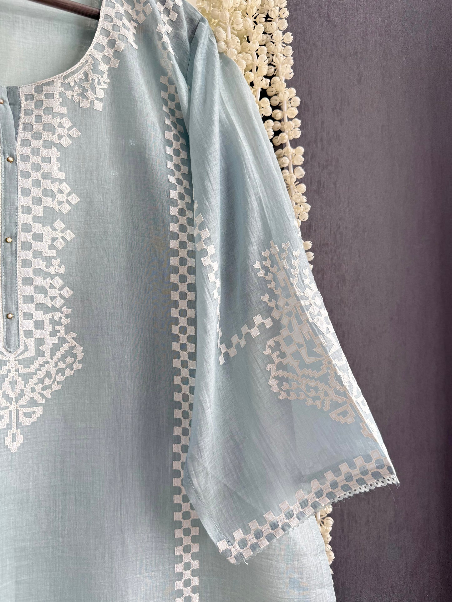Luxurious Mul chanderi appliqué work suit