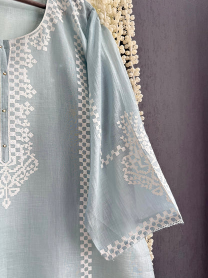 Luxurious Mul chanderi appliqué work suit