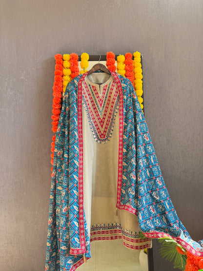 Luxurious patola crush tissue silk suit