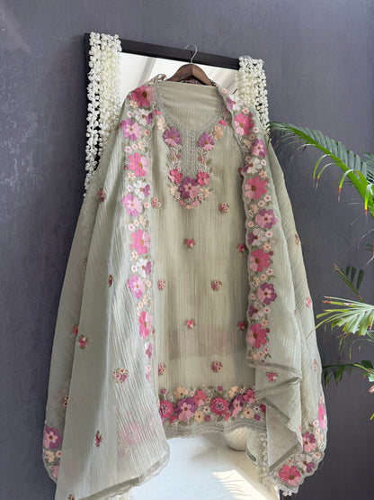 Luxurious Mul chanderi appliqué work floral suit