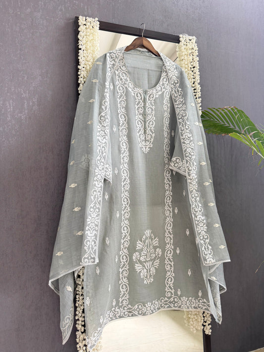 Luxurious Mul chanderi appliqué work suit