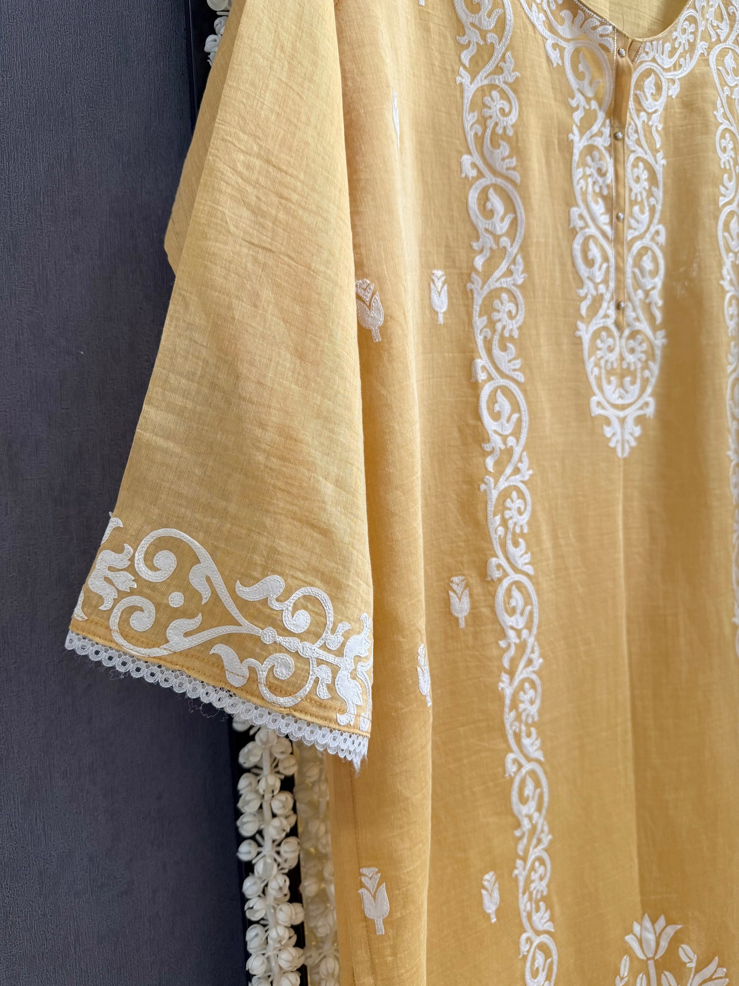 Luxurious Mul chanderi appliqué work suit