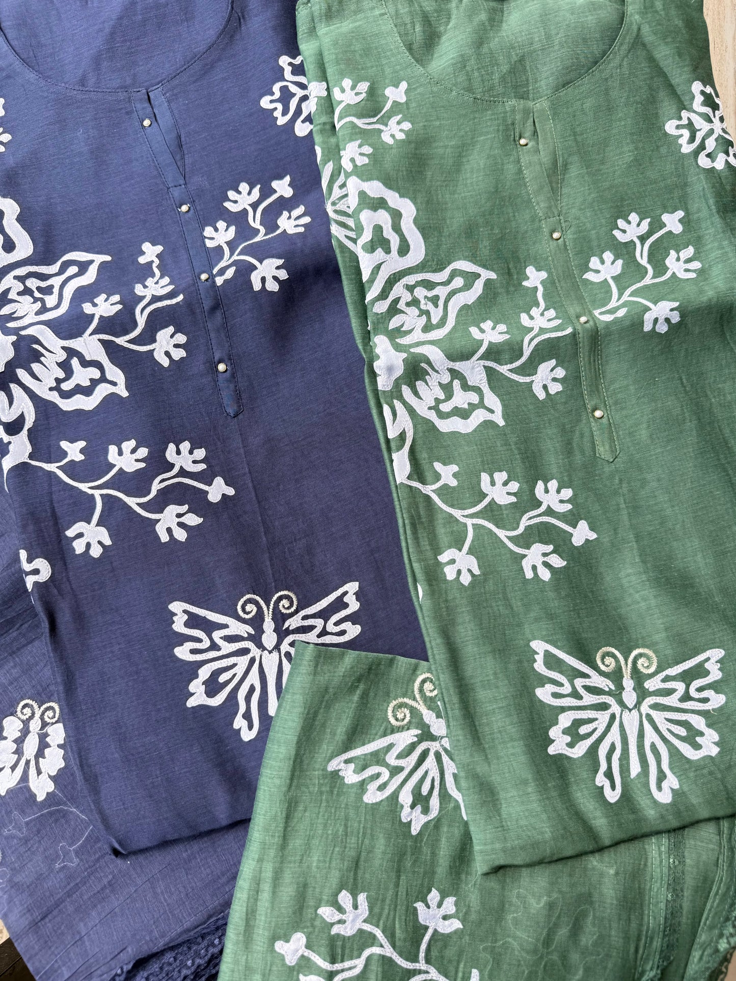 Luxurious Mul chanderi appliqué butterfly suit