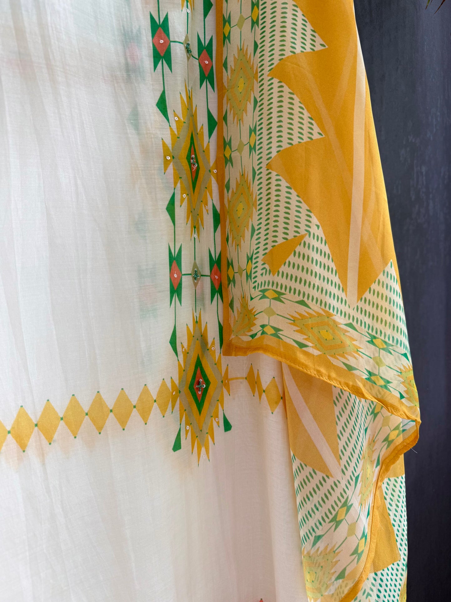 Muslin ikkat inspired handwork suits