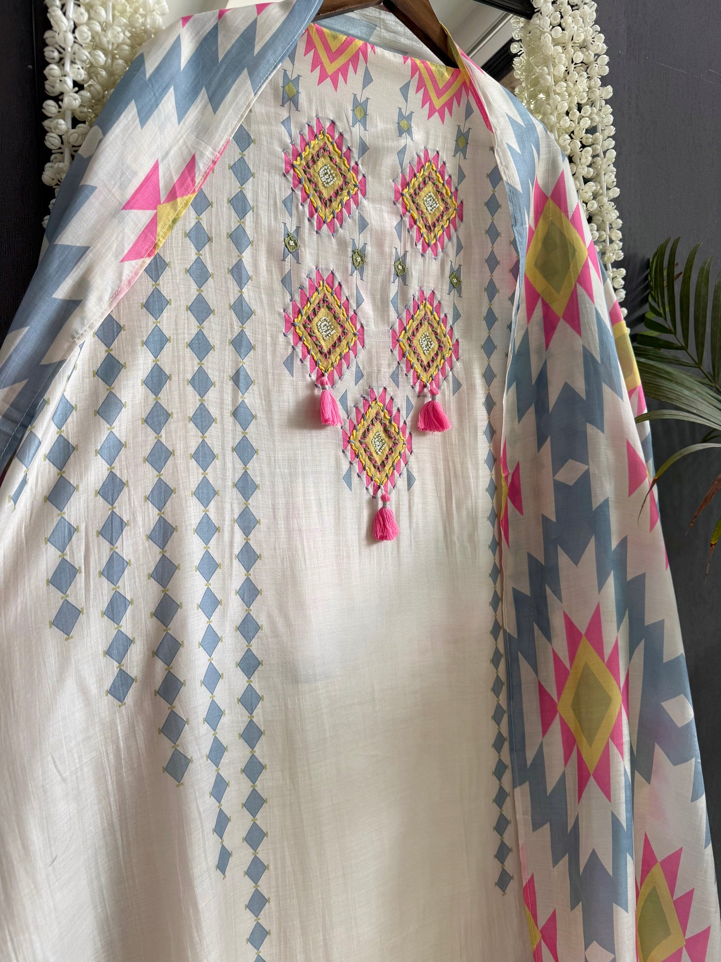 Muslin ikkat inspired handwork suits