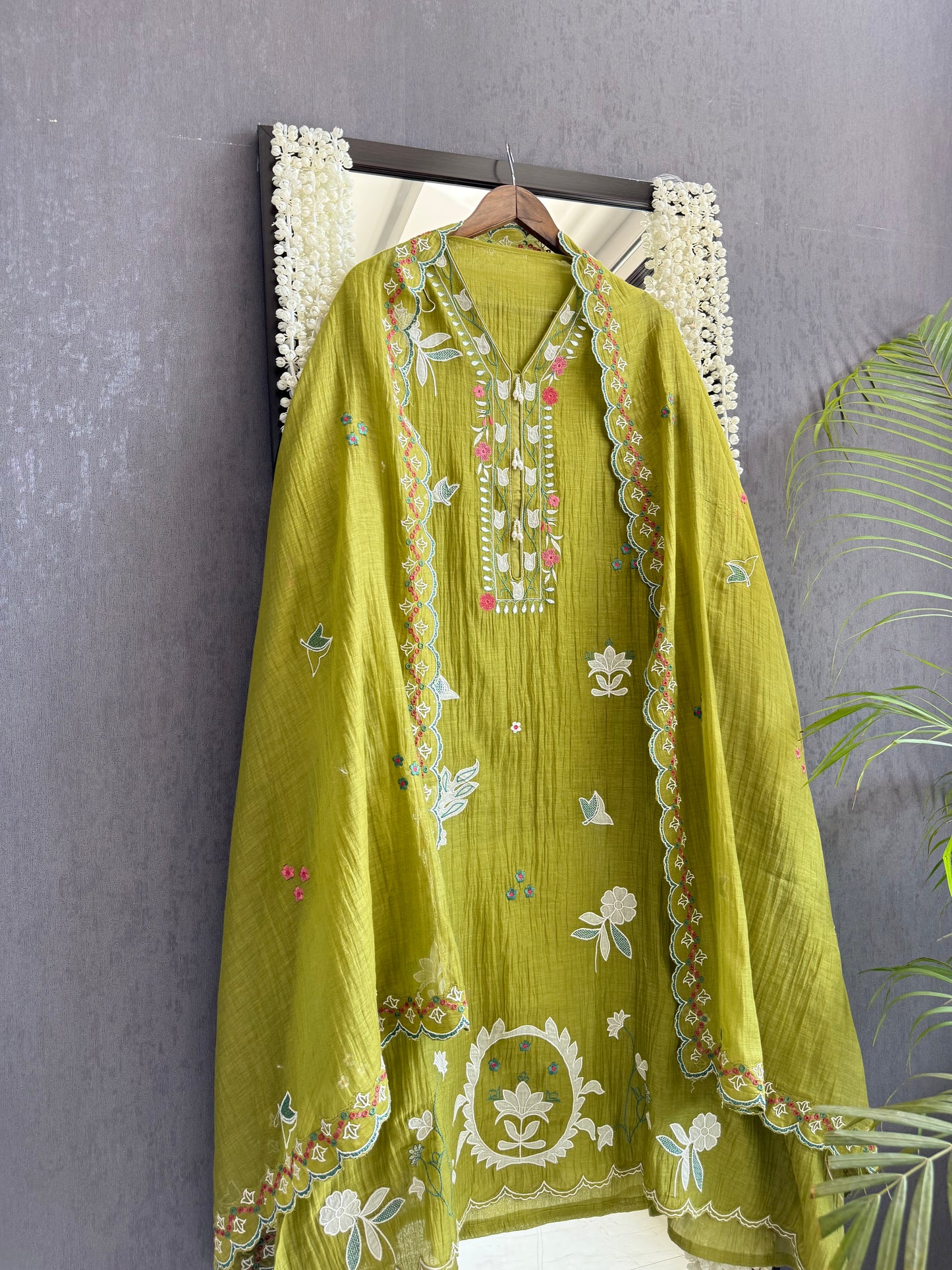 Luxurious Mul chanderi appliqué work suit