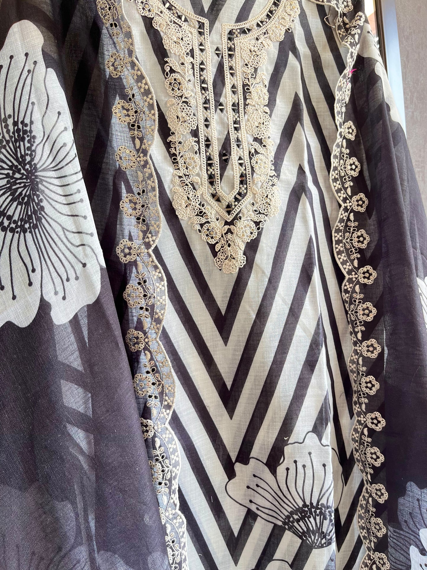 Aari work premium linen suits