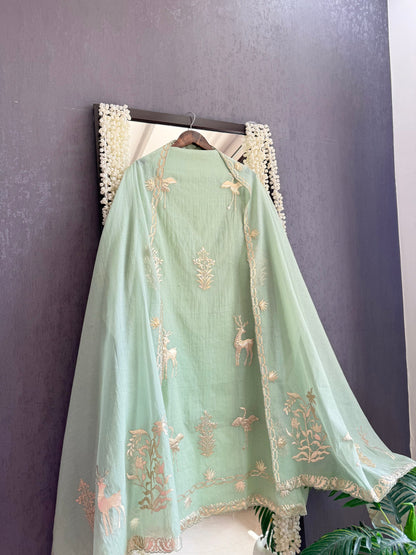 Luxurious Mul chanderi appliqué work suit