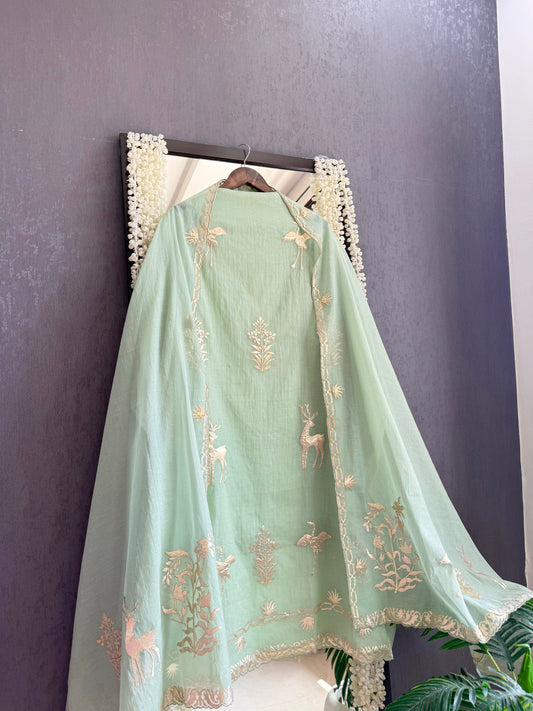 Luxurious Mul chanderi appliqué work suit