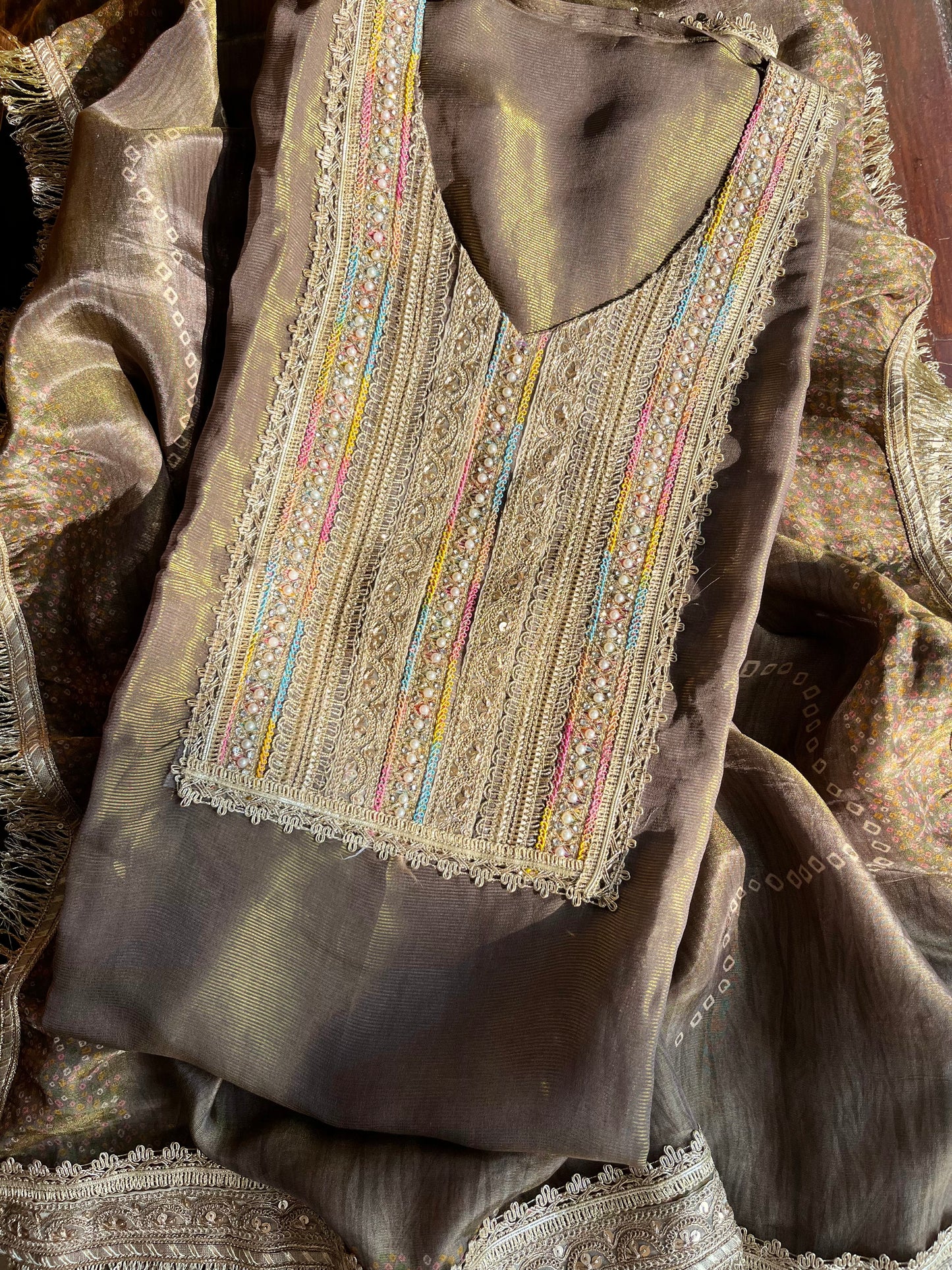 Luxurious zari woven tissue silk suit