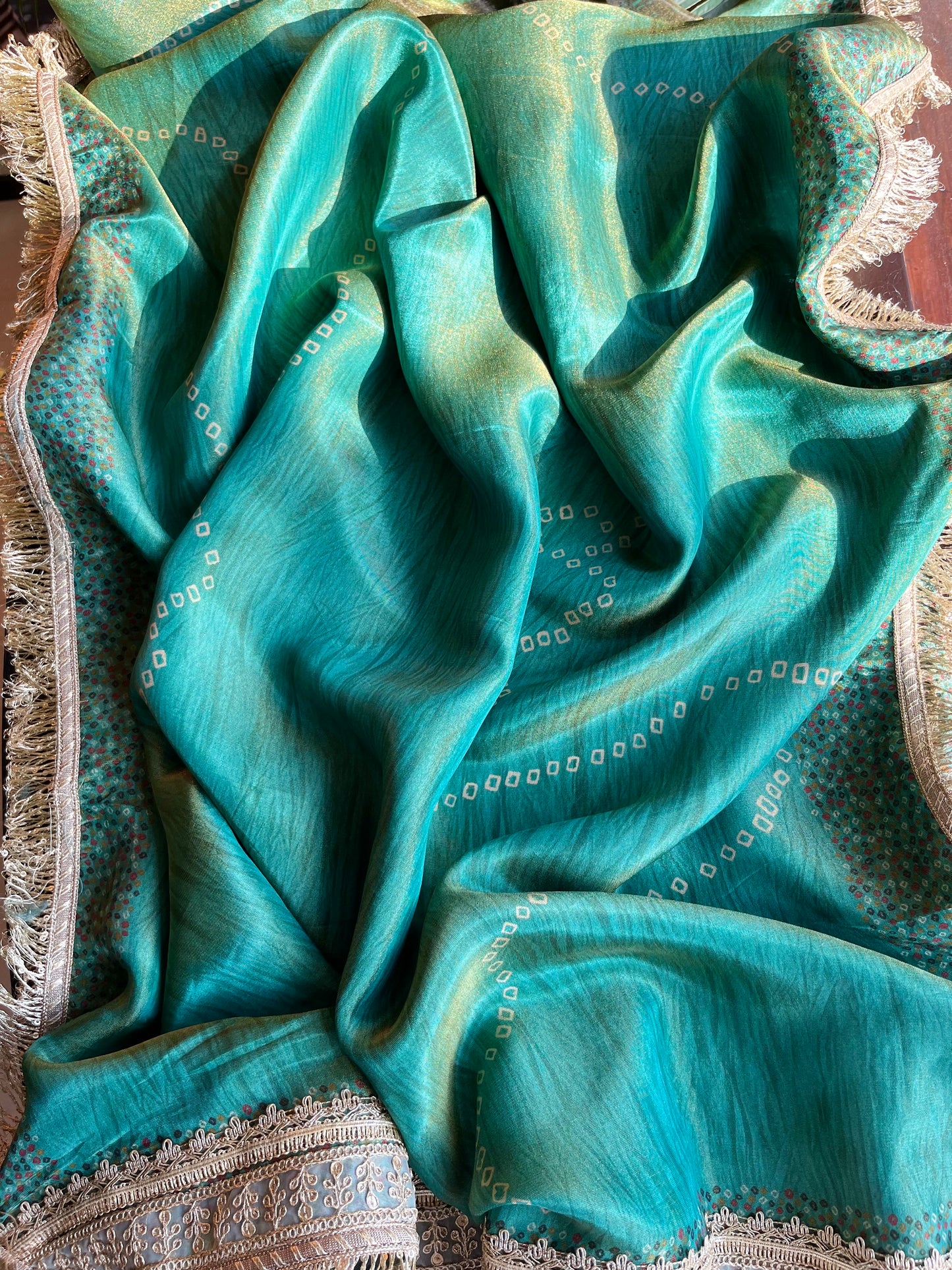 Luxurious zari woven tissue silk suit