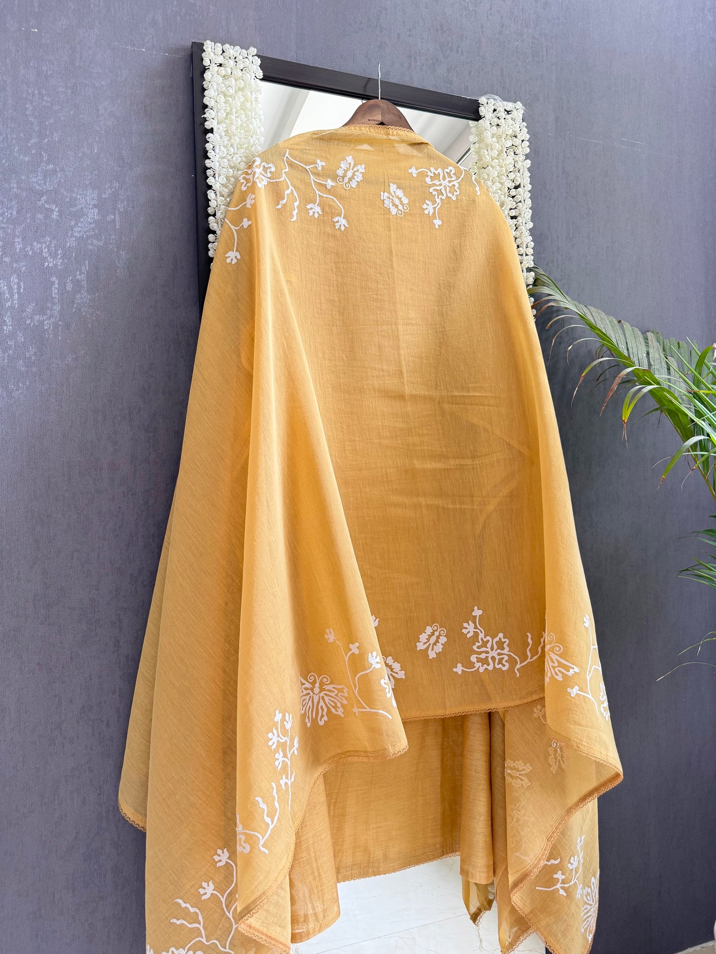 Luxurious Mul chanderi appliqué butterfly suit