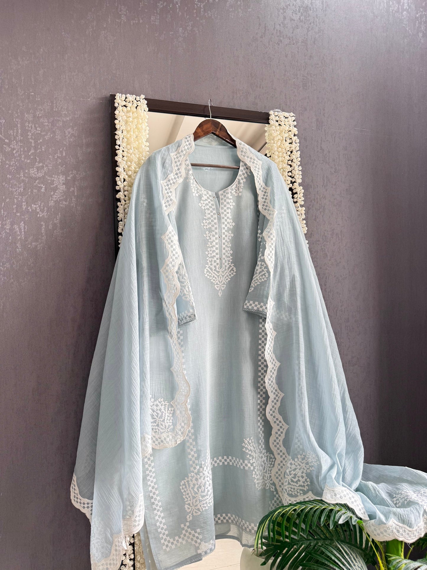 Luxurious Mul chanderi appliqué work suit
