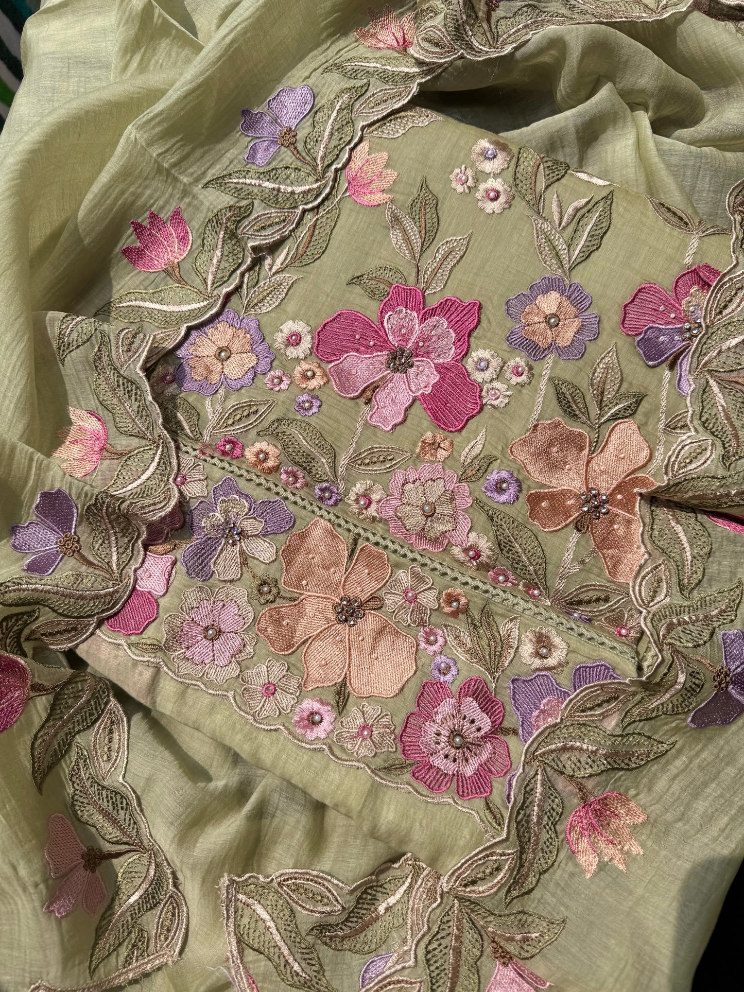 Luxurious Mul chanderi appliqué work floral suit