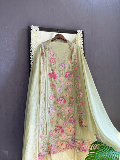Luxurious Mul chanderi appliqué work floral suit
