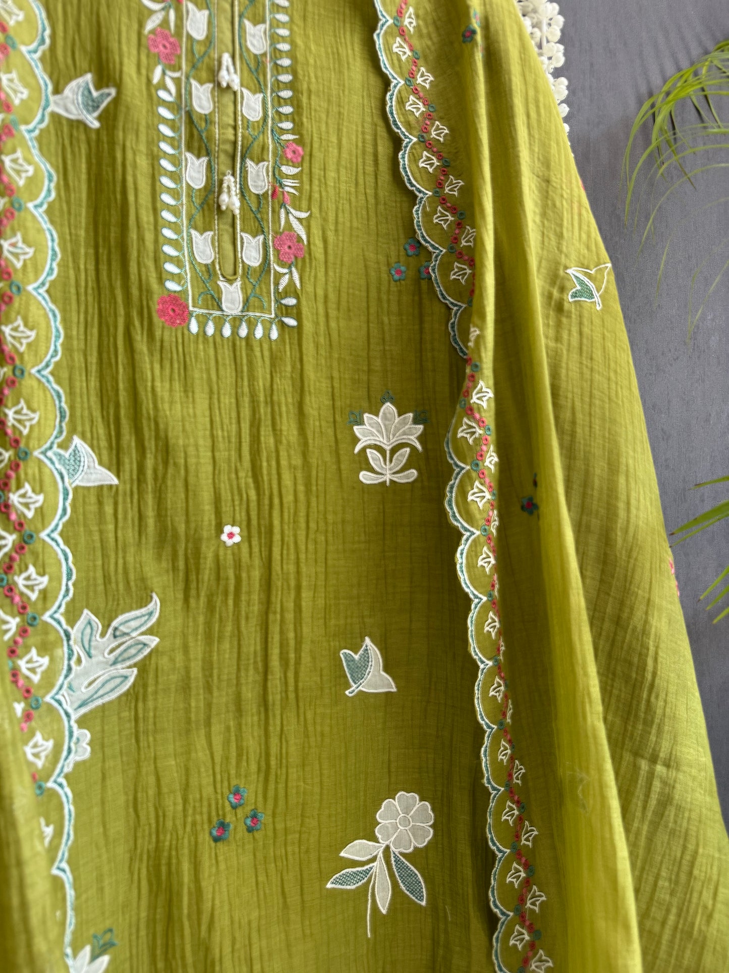 Luxurious Mul chanderi appliqué work suit