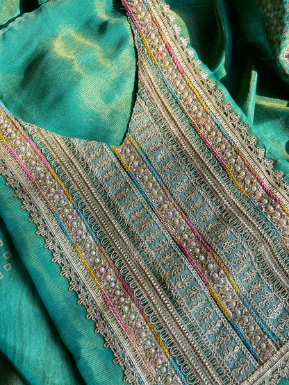 Luxurious zari woven tissue silk suit