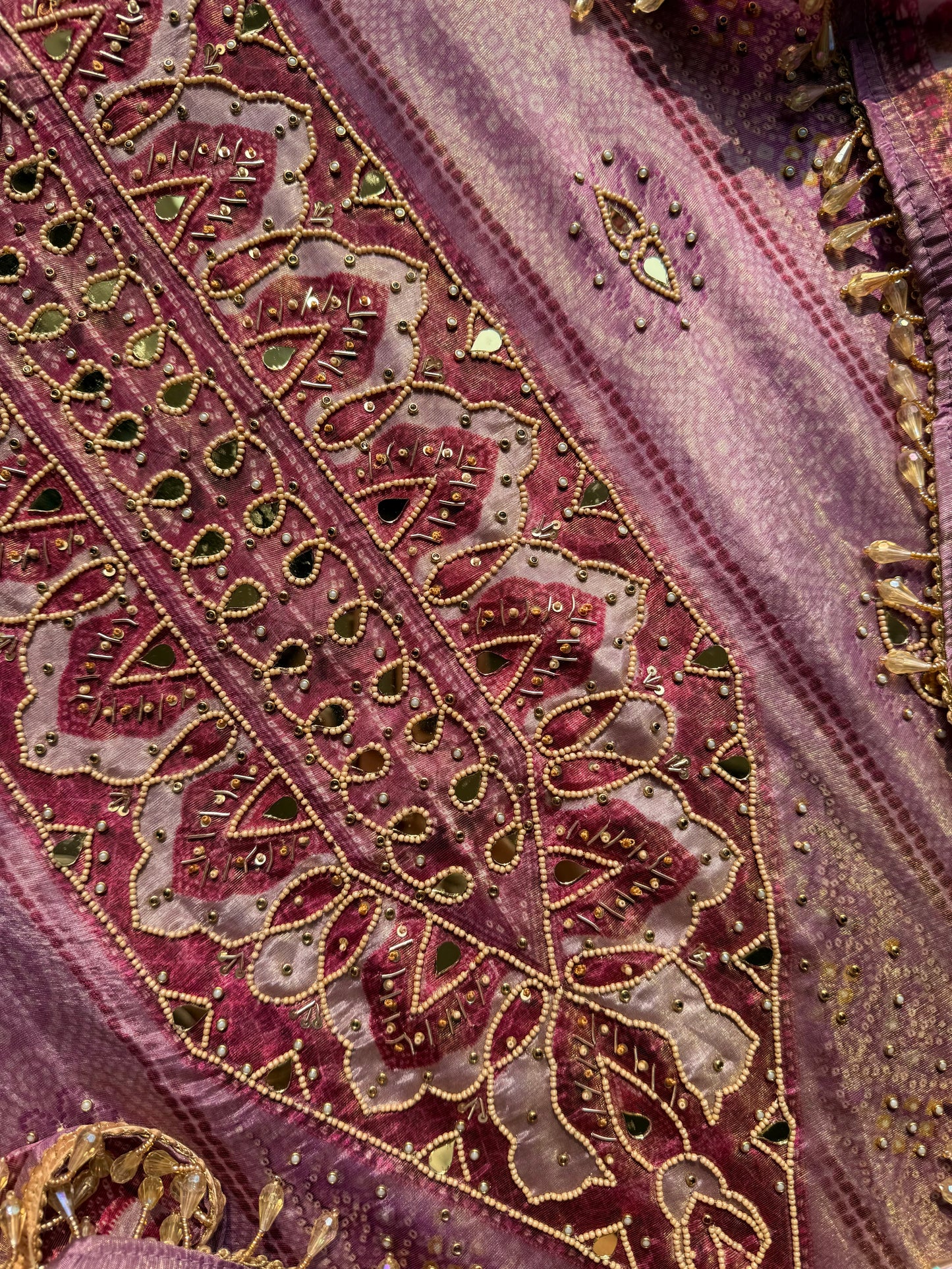 Luxurious bandhani hearts kundan suit