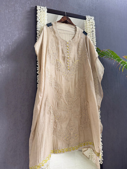 Luxurious Mul chanderi appliqué work suit