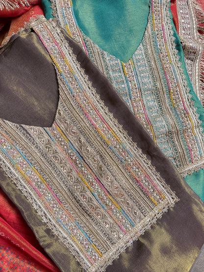 Luxurious zari woven tissue silk suit