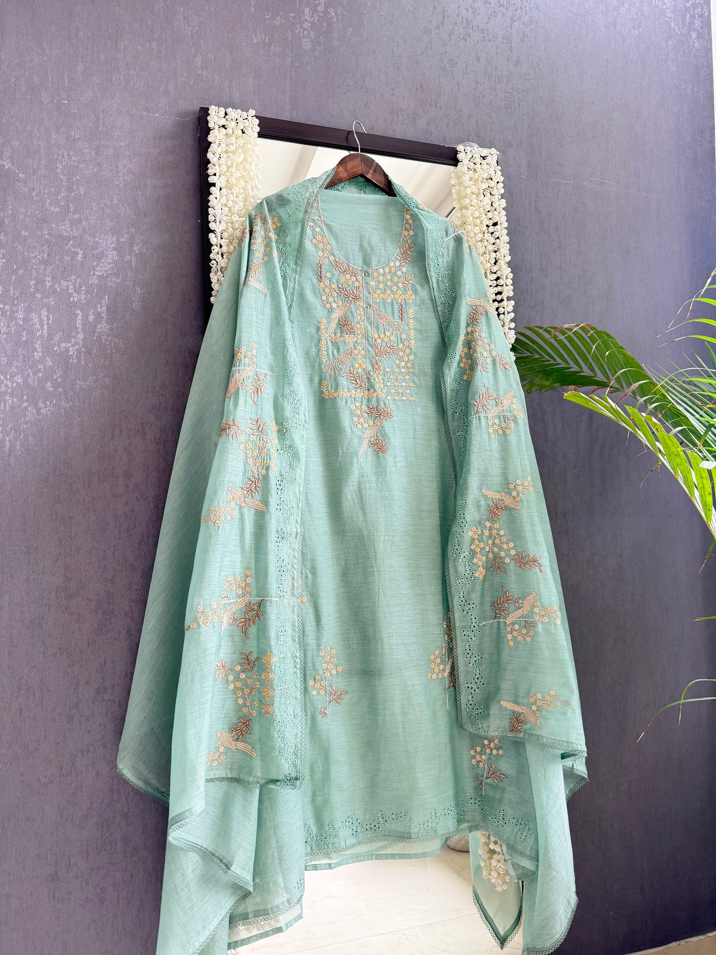 Luxurious Mul chanderi schiffili peacock suit