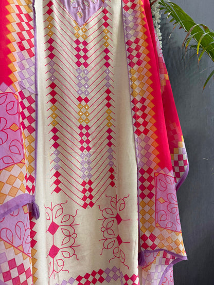 Muslin ikkat inspired handwork suits
