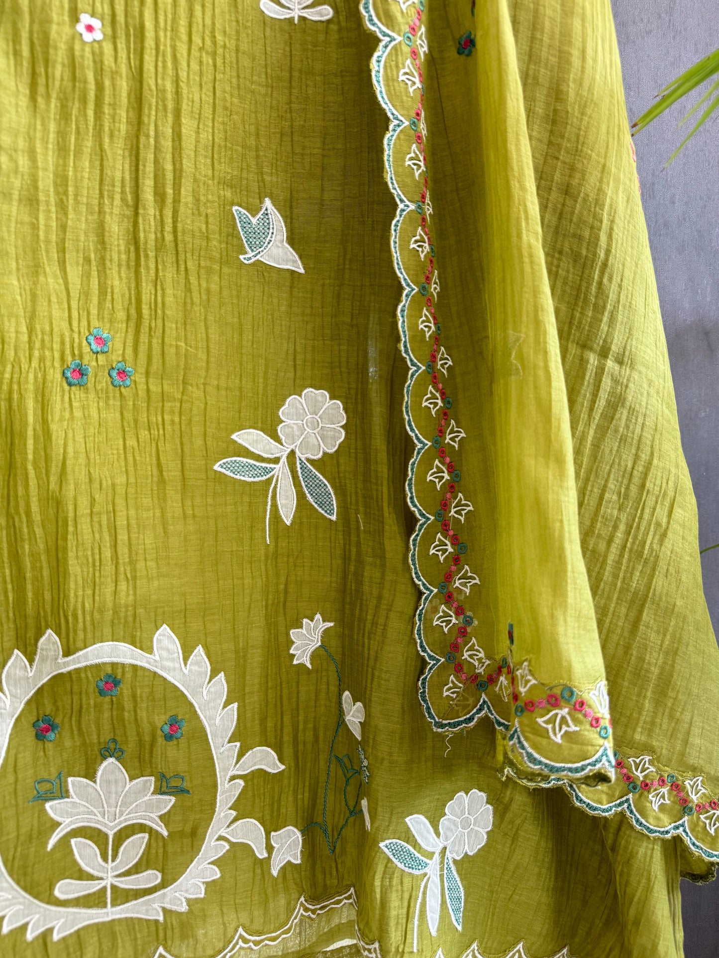 Luxurious Mul chanderi appliqué work suit