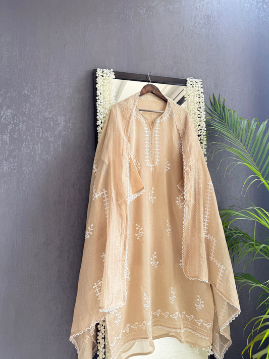 Luxurious Mul chanderi appliqué work suit
