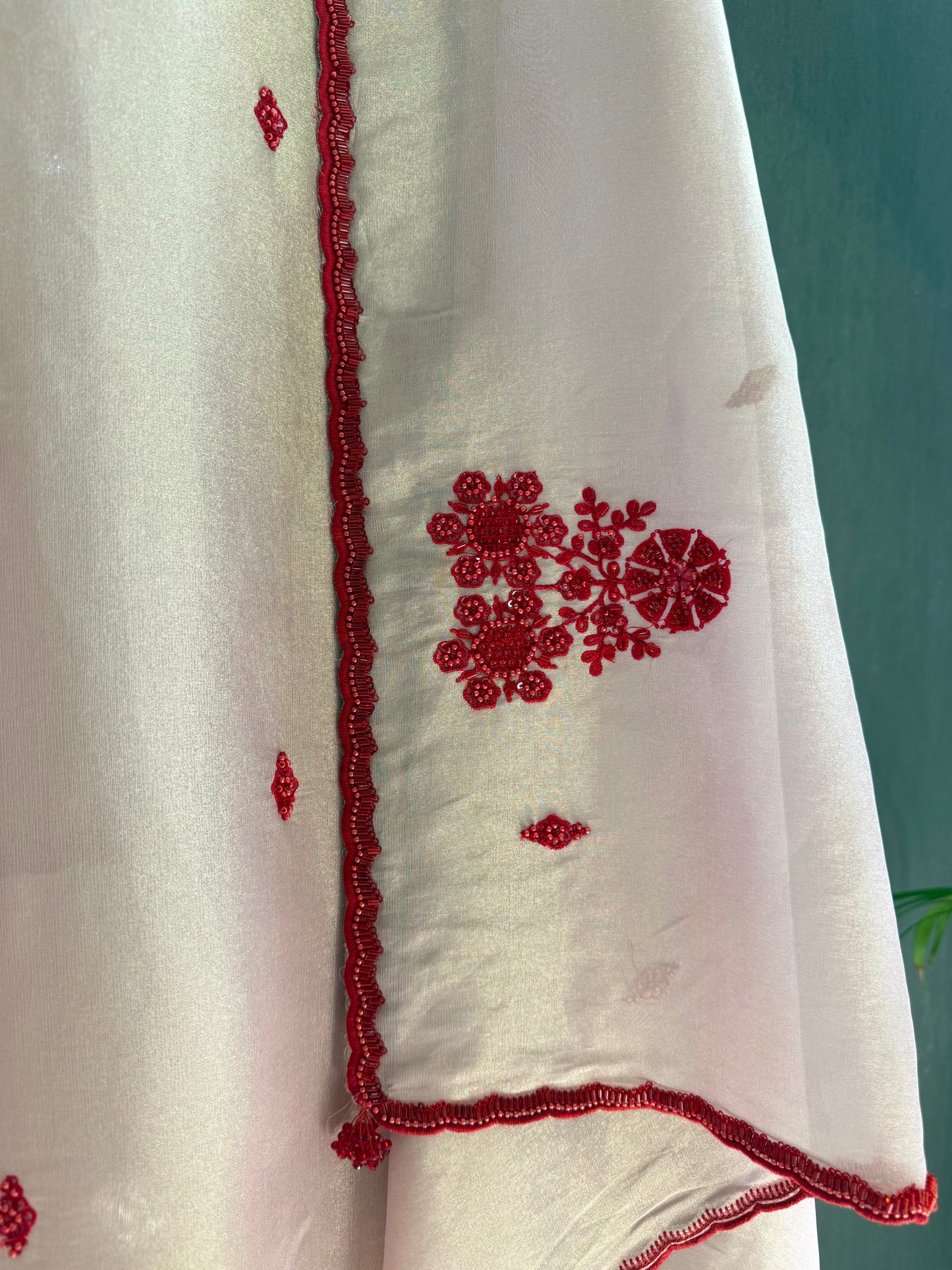 Luxurious ruby bejewelled suit