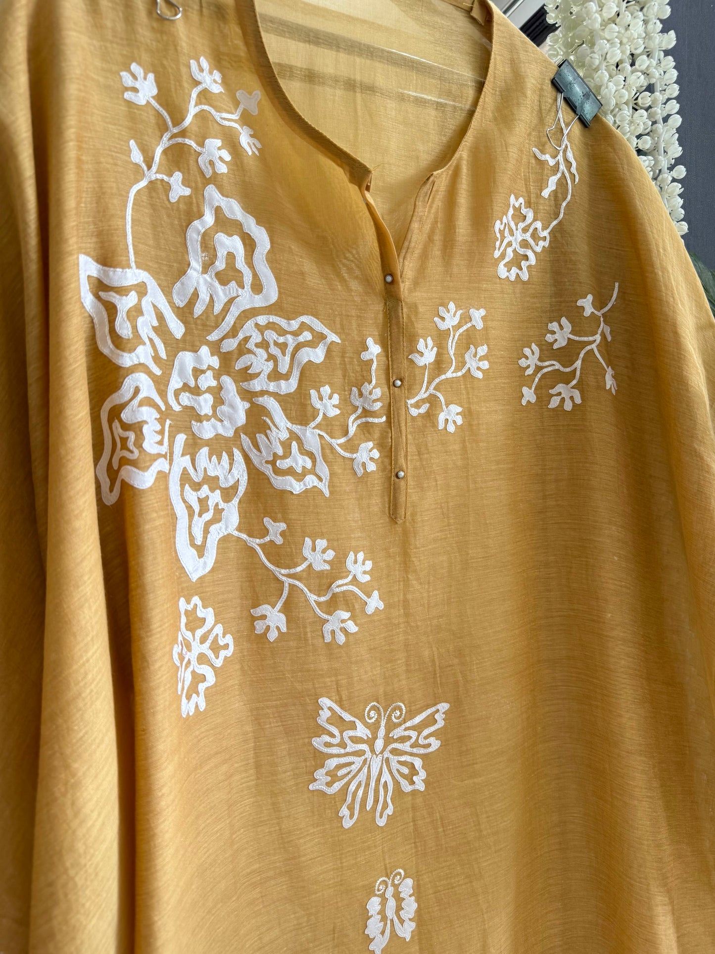 Luxurious Mul chanderi appliqué butterfly suit