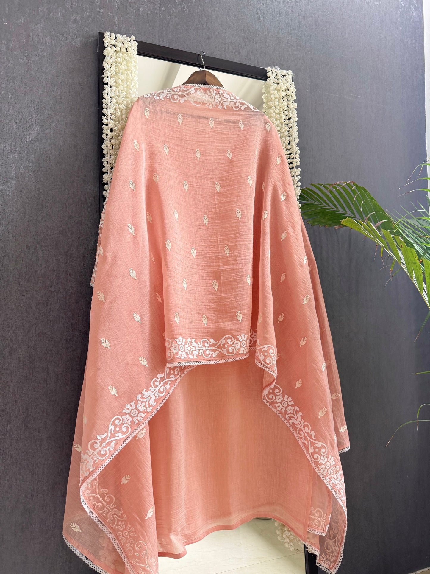 Luxurious Mul chanderi appliqué work suit