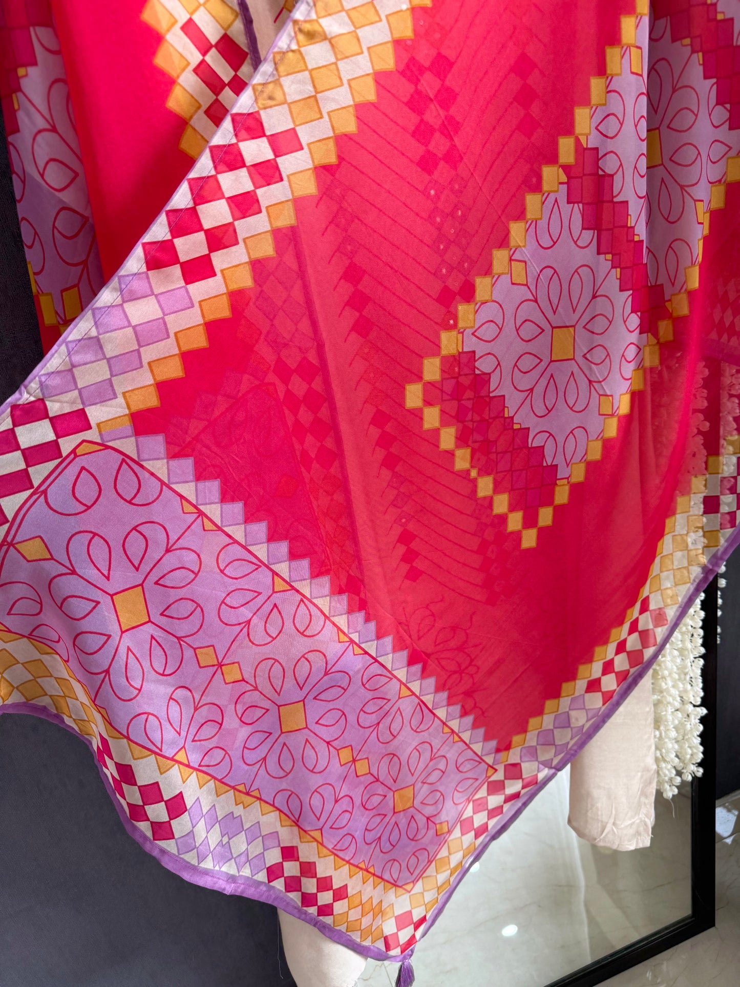 Muslin ikkat inspired handwork suits
