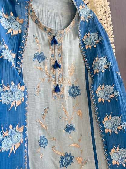 Luxurious Mul chanderi appliqué floral suit