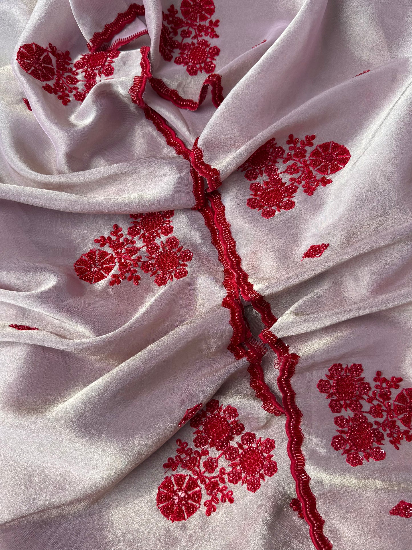 Luxurious ruby bejewelled suit