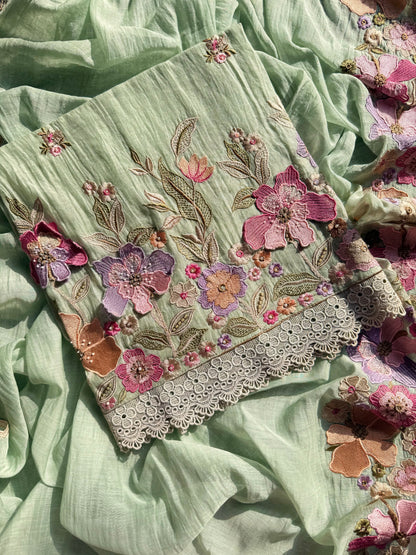 Luxurious Mul chanderi appliqué work floral suit
