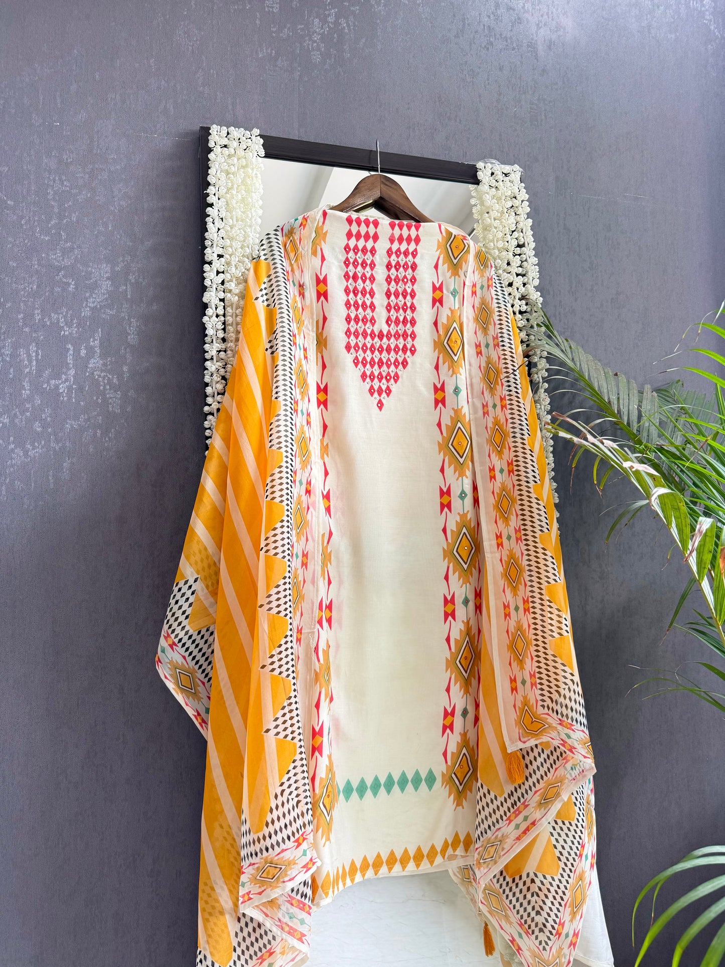 Muslin ikkat inspired handwork suits