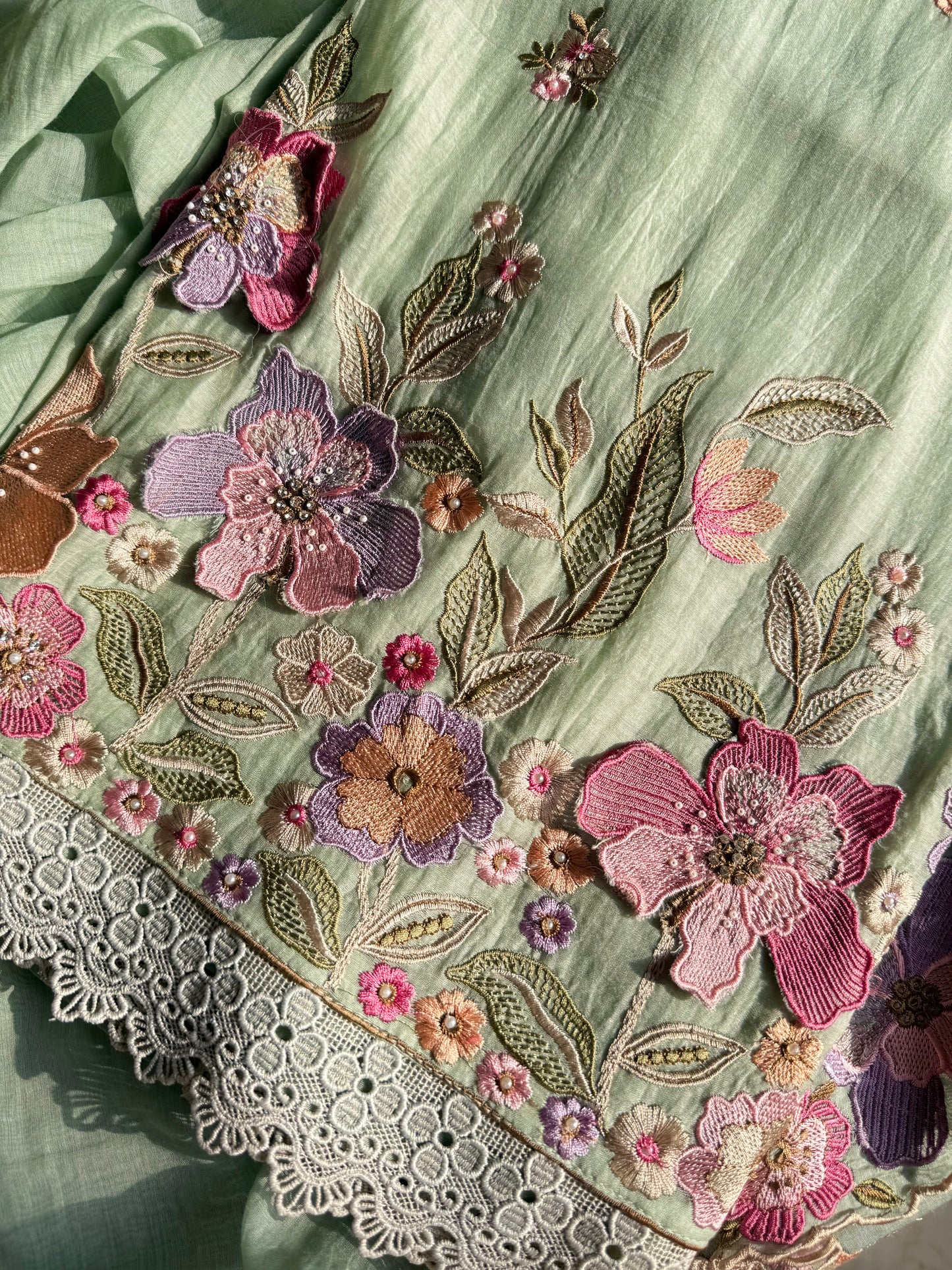Luxurious Mul chanderi appliqué work floral suit