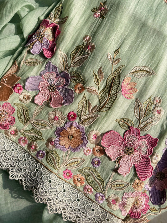Luxurious Mul chanderi appliqué work floral suit