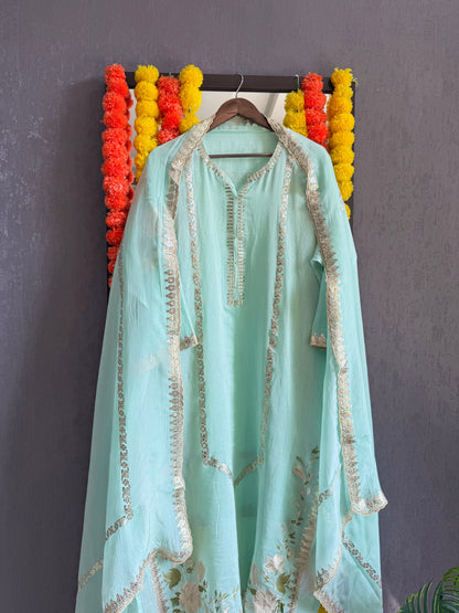 Luxurious Mul chanderi gold appliqué work suit