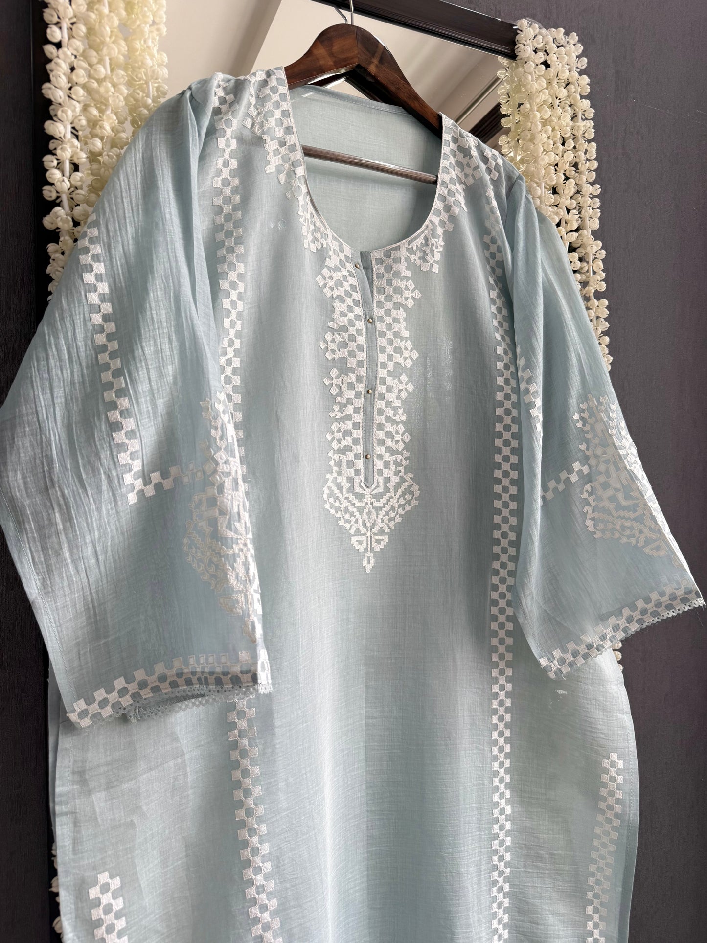 Luxurious Mul chanderi appliqué work suit