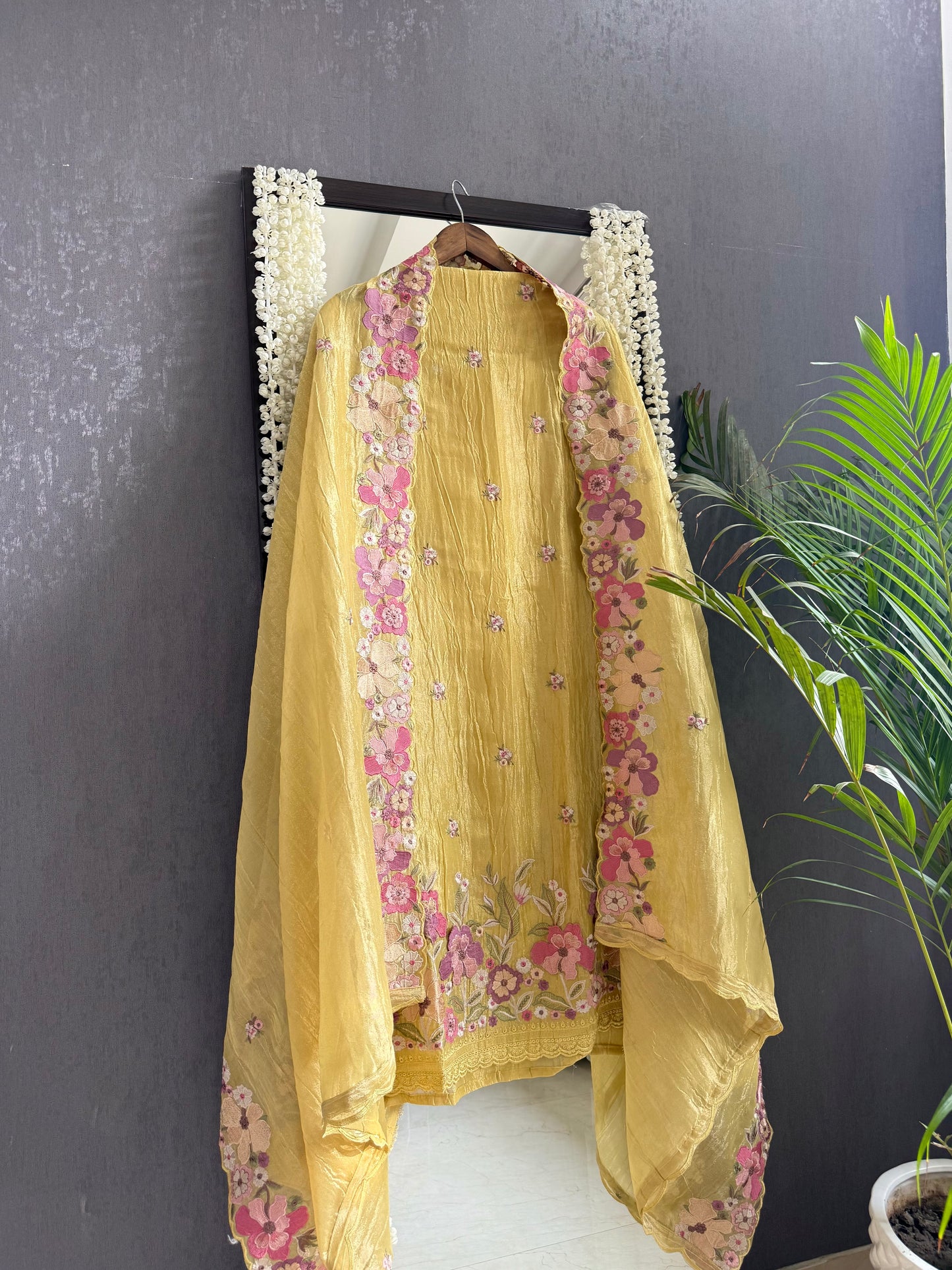 Luxurious Mul chanderi appliqué work floral suit