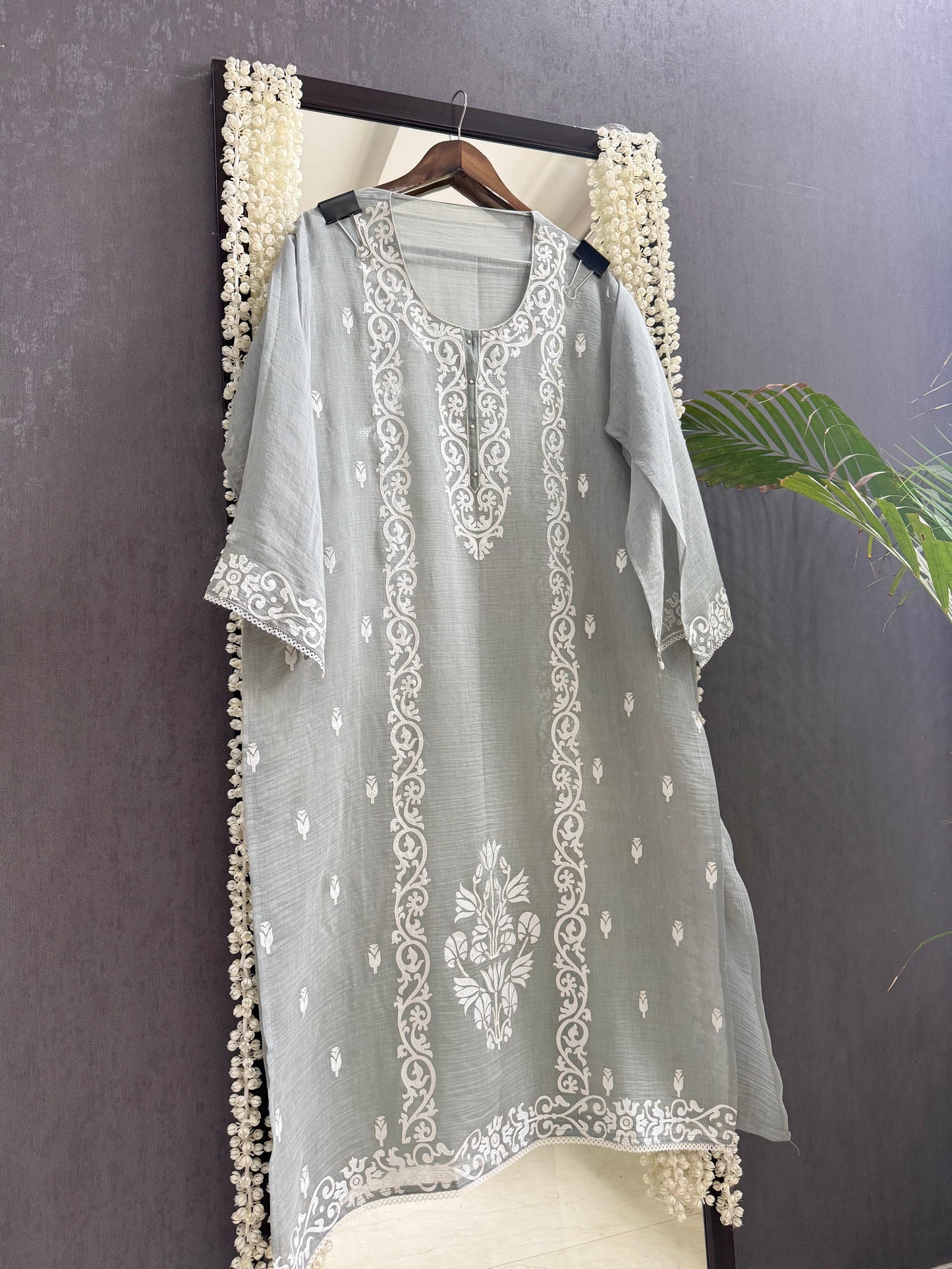 Luxurious Mul chanderi appliqué work suit