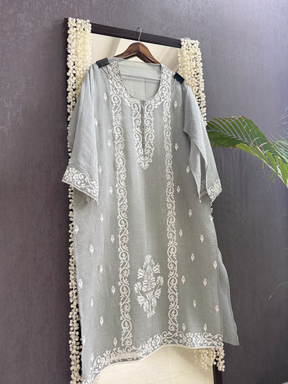 Luxurious Mul chanderi appliqué work suit