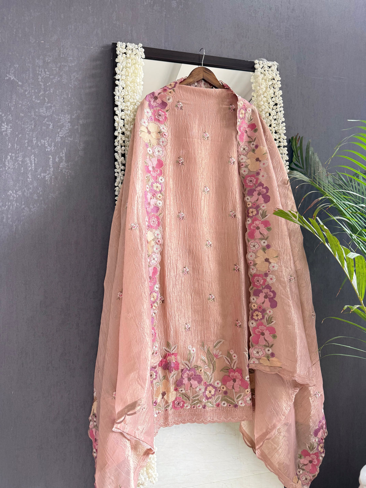 Luxurious Mul chanderi appliqué work floral suit
