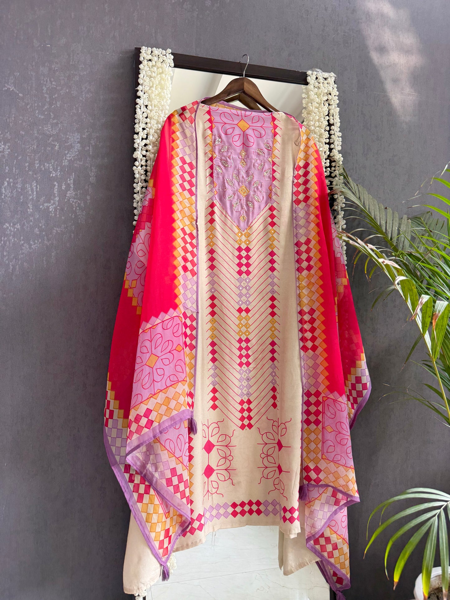 Muslin ikkat inspired handwork suits