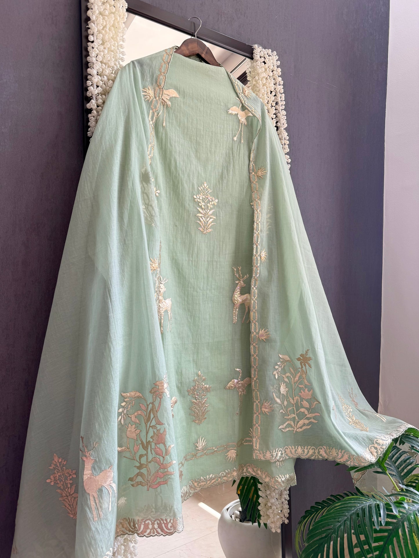 Luxurious Mul chanderi appliqué work suit